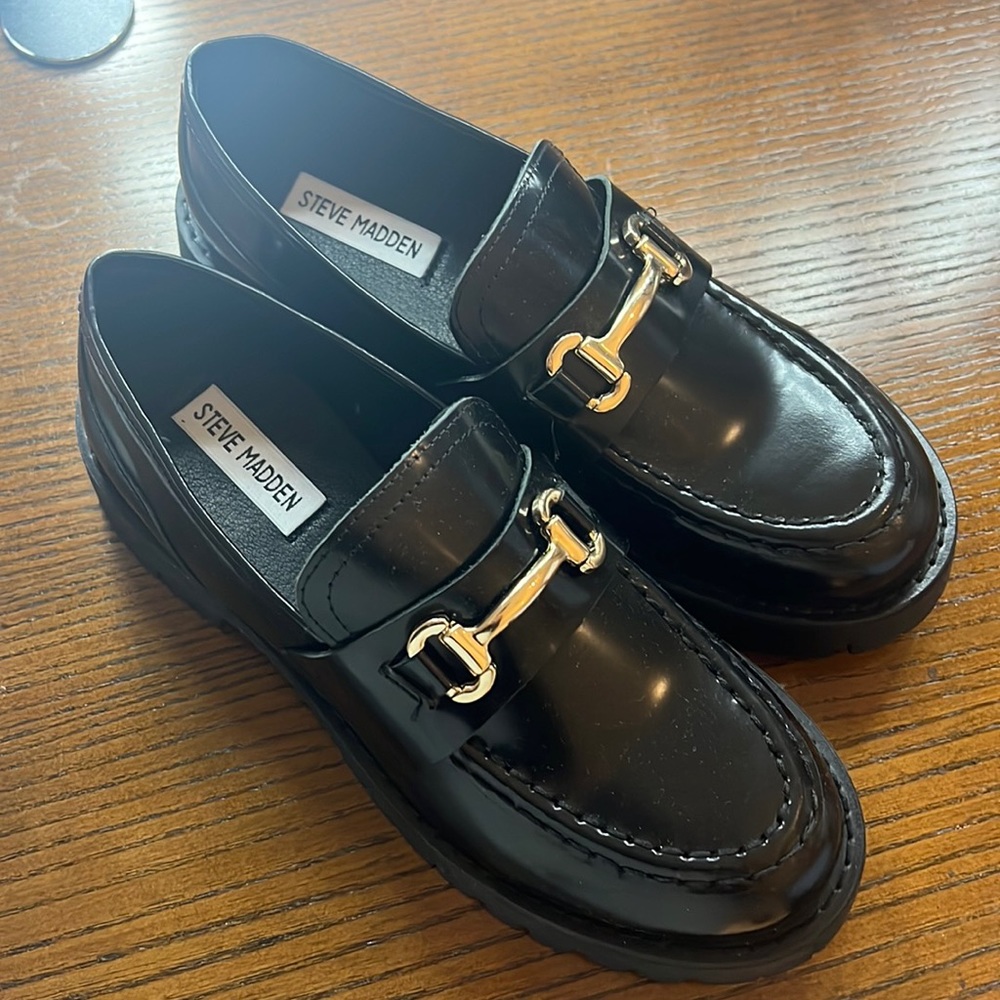 Black platform loafers